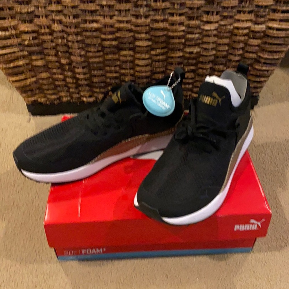 Puma soft foam sneakers.